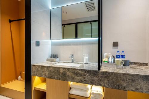 Ένα μπάνιο στο Joyinn Z Hotel