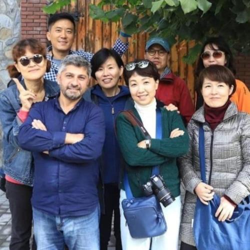 a group of people posing for a picture at Ilgar's Hostel in Sheki