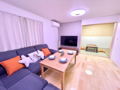 TV a/nebo společenská místnost v ubytování Skytree Urban House