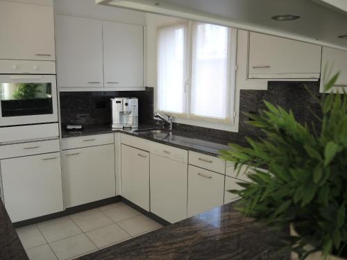 Cuisine ou kitchenette dans l'établissement Bicledro by Fewotessin