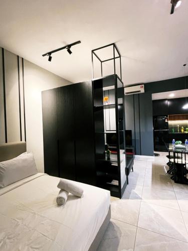 Postel nebo postele na pokoji v ubytování Axon residences Bukit Bintang BY times square