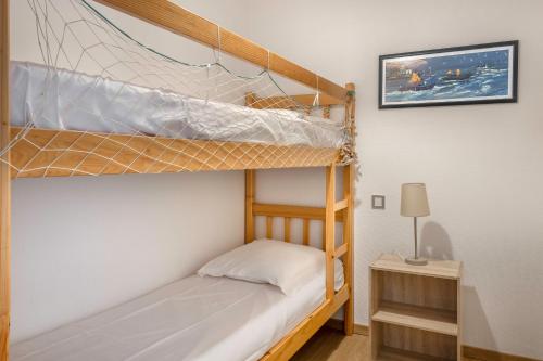 Katil atau katil-katil dalam bilik di Appart pour 2 adultes et 1 enfant- Vue sur le Port