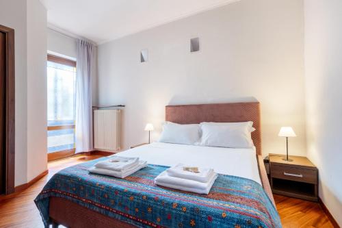 Giường trong phòng chung tại La Grande Casa - City Center