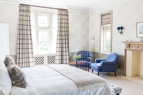 En eller flere senge i et værelse på Royal Racing Retreat in Newmarket