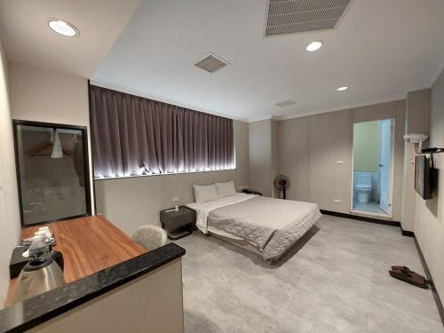 Kuchyň nebo kuchyňský kout v ubytování Hwa Nan Hotel