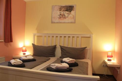 En eller flere senge i et værelse på Ferienhaus Cottbus