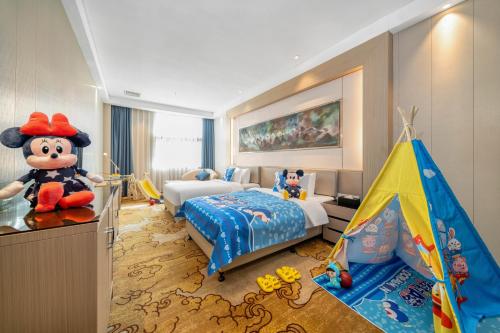 Cama o camas de una habitación en Dayhello Hotel Shenzhen Shekou
