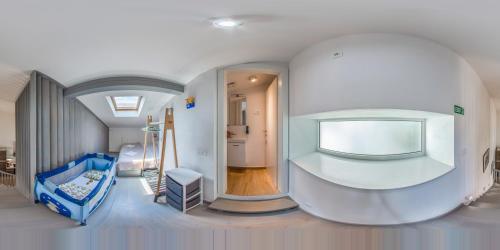 a room with a room with a tv and a bed at Villa Klara in Vodice