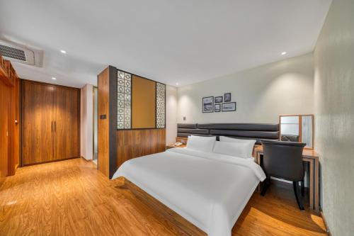 Cama o camas de una habitación en Dayhello Hotel Shenzhen Shekou
