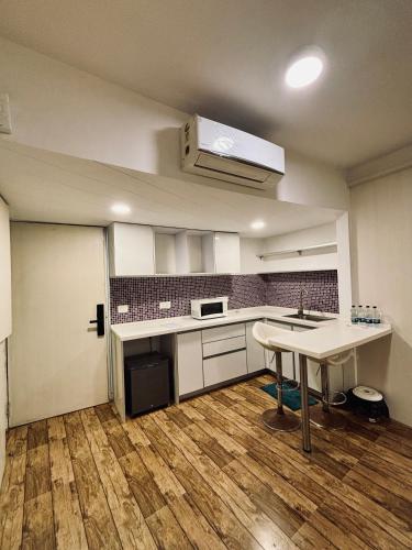Kuchyň nebo kuchyňský kout v ubytování Rajhans Belliza By Honest Homes
