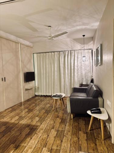 TV a/nebo společenská místnost v ubytování Rajhans Belliza By Honest Homes
