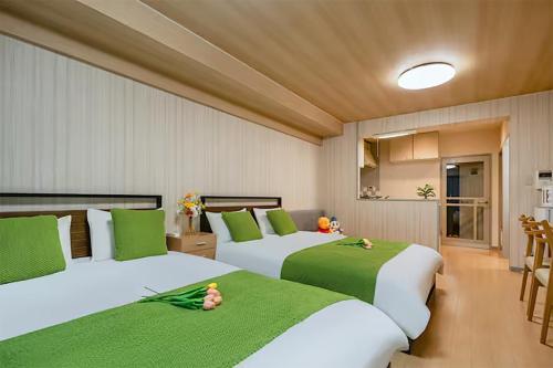 Postel nebo postele na pokoji v ubytování Room 204 Nishi-Shinjuku Gochome 9 minutes walk 40 square meters Sleeps up to 6 people