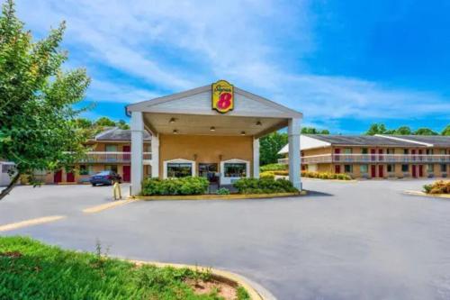 a front view of a hotel at Studio 6 Suites Charlotte, NC Northlake in Charlotte