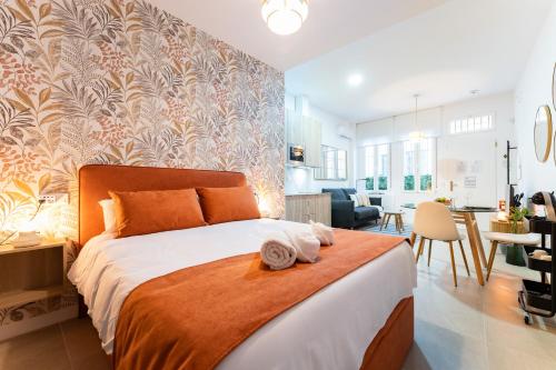 Ένα ή περισσότερα κρεβάτια σε δωμάτιο στο PEPINI Estudio