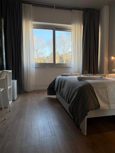 Una cama o camas en una habitación de Guest House VB Luxury Suites