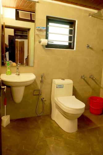 Koupelna v ubytování Mulanthanam resorts and Home stay