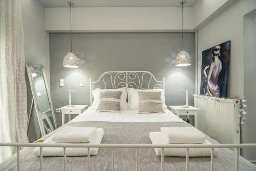 Ένα ή περισσότερα κρεβάτια σε δωμάτιο στο Villa Katrina by PosarelliVillas