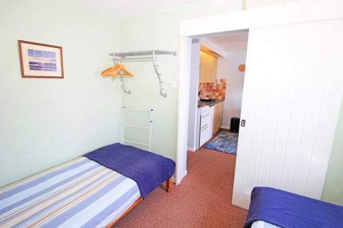 Katil atau katil-katil dalam bilik di Harbour Flat - 12E South Snowdon Wharf
