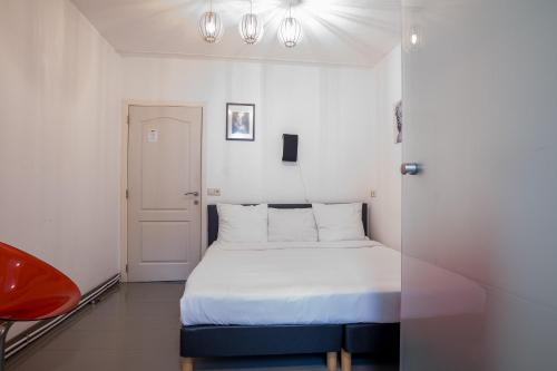 Hotel Urban Dreamsにあるベッド