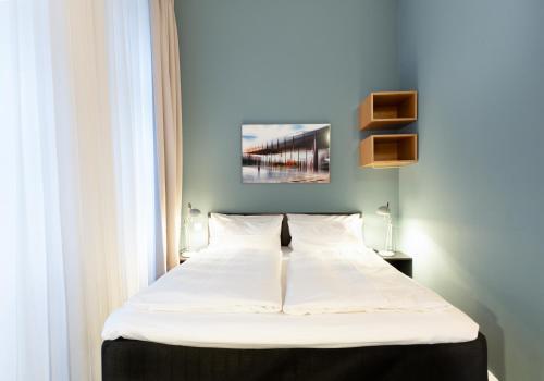Postel nebo postele na pokoji v ubytování Hotel Johann
