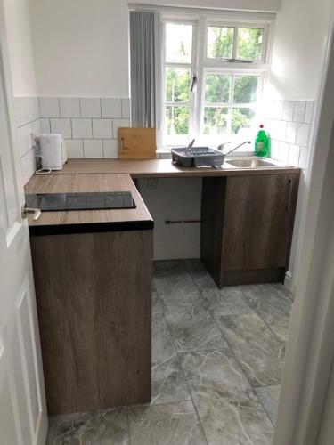 Η κουζίνα ή μικρή κουζίνα στο Lancaster Apartment