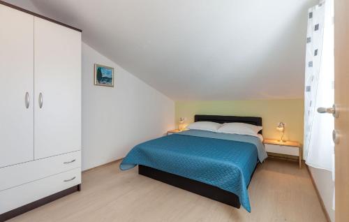 מיטה או מיטות בחדר ב-Apartments Kike