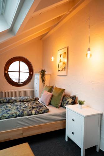 a room with a bed and a window at Baptistle in Hüfingen