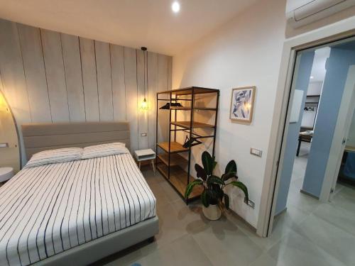 Postel nebo postele na pokoji v ubytování Playa-degli-Angeli-LIBECCIO