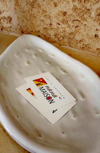 a piece of cheese with a sticker on it at Nanà Maison in Nardò