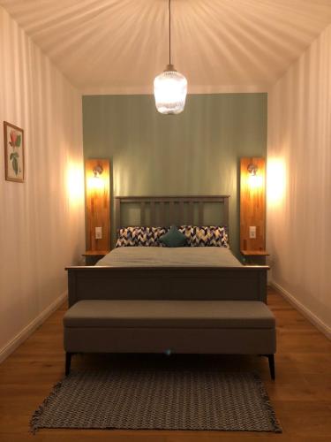 En eller flere senge i et værelse på MSF Apartment Blauer Wolf