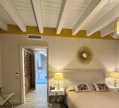 Кровать или кровати в номере Hotel San Michele