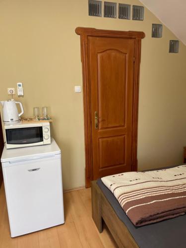 Küche/Küchenzeile in der Unterkunft Rózsakert Apartmanház