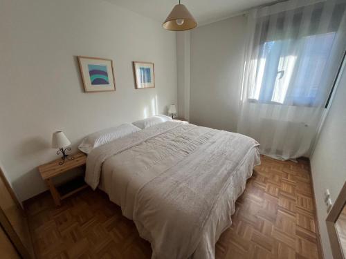 En eller flere senge i et værelse på La Fragüa de Solatorre