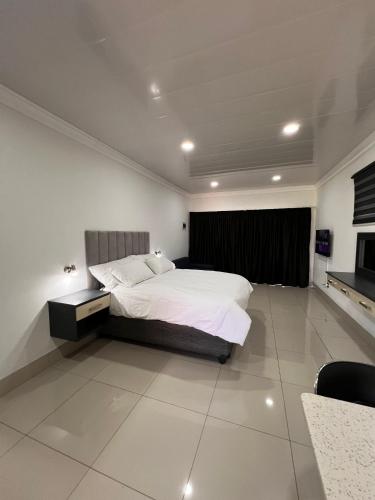 Televisyen dan/atau pusat hiburan di Oasis Lux Apartments