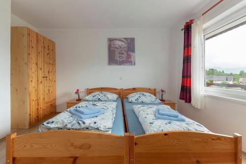 Apartments Bor tesisinde bir odada yatak veya yataklar