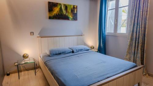 Postel nebo postele na pokoji v ubytování Les Brisants 21