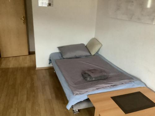 Ένα ή περισσότερα κρεβάτια σε δωμάτιο στο Ferienwohnung Eva und Alexander