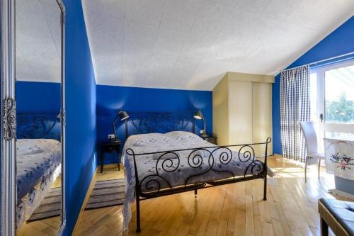 Кровать или кровати в номере Family Four Bedroom Holiday Home with Pool