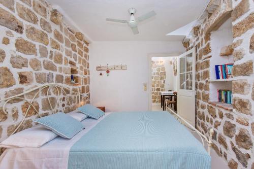 Postel nebo postele na pokoji v ubytování Peti Apartment