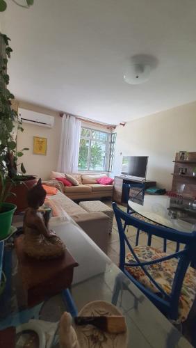 Posezení v ubytování Quarto Pacífico