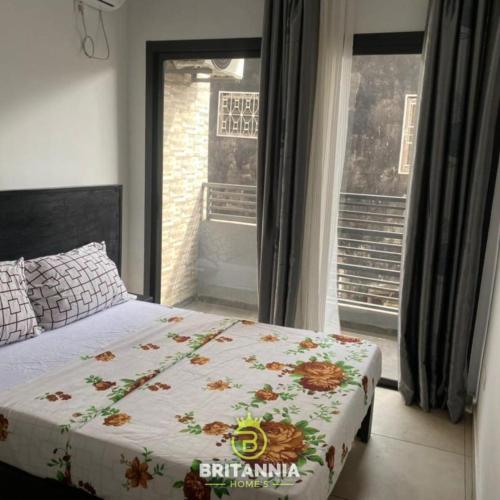 Llit o llits en una habitació de Britannia Homes