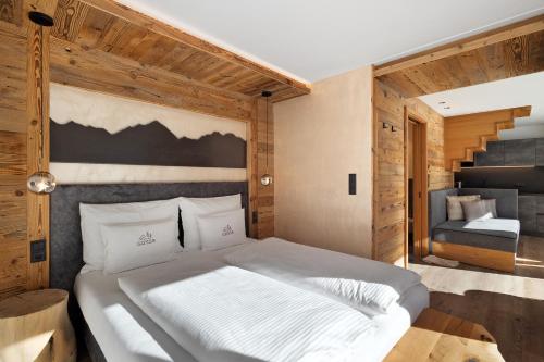 Postel nebo postele na pokoji v ubytování Chalet-Suite Panorama