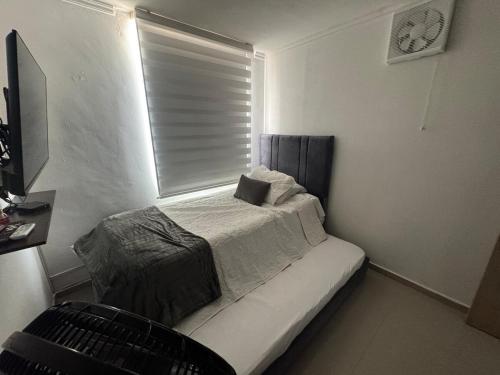 Postel nebo postele na pokoji v ubytování Apto Santa Marta 3Hb,1B,AC,Wifi 500 MB