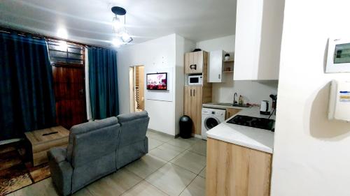 Η κουζίνα ή μικρή κουζίνα στο Effortless Budget Apartment Southernwood