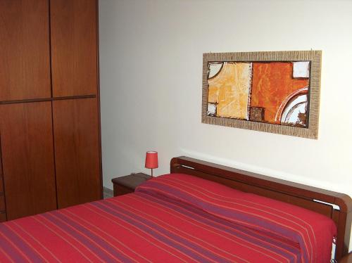 Katil atau katil-katil dalam bilik di Casa del Tritone