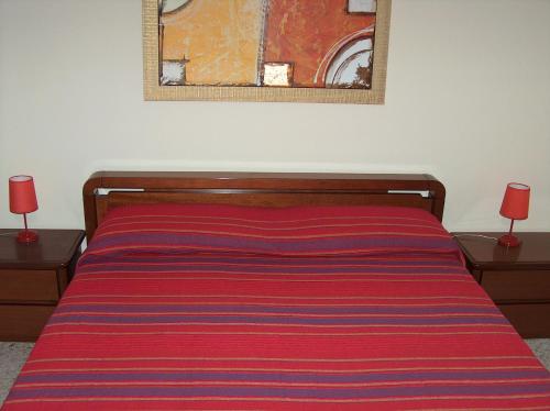 Katil atau katil-katil dalam bilik di Casa del Tritone
