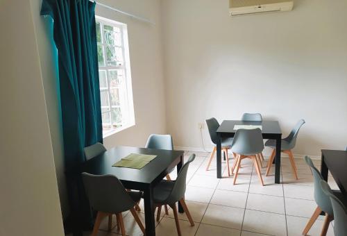 Χώρος καθιστικού στο Courtyard Guest House