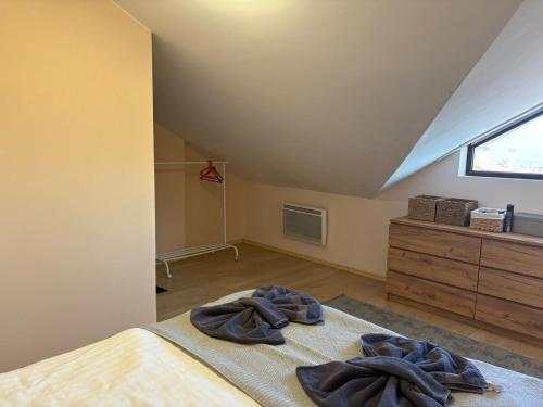 Ένα ή περισσότερα κρεβάτια σε δωμάτιο στο Bansko Spomar