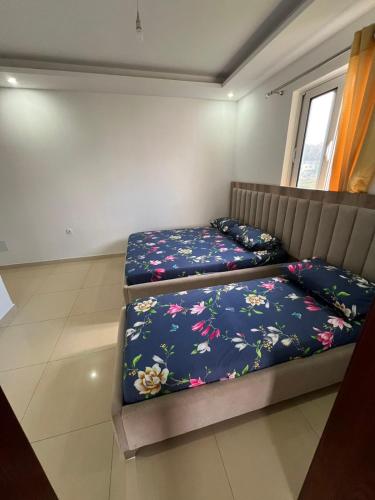 Ένα ή περισσότερα κρεβάτια σε δωμάτιο στο Apartments Bettii