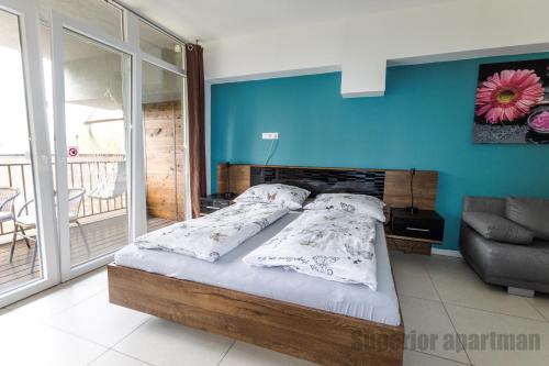 Posteľ alebo postele v izbe v ubytovaní Tisza Gyöngye Apartmanok